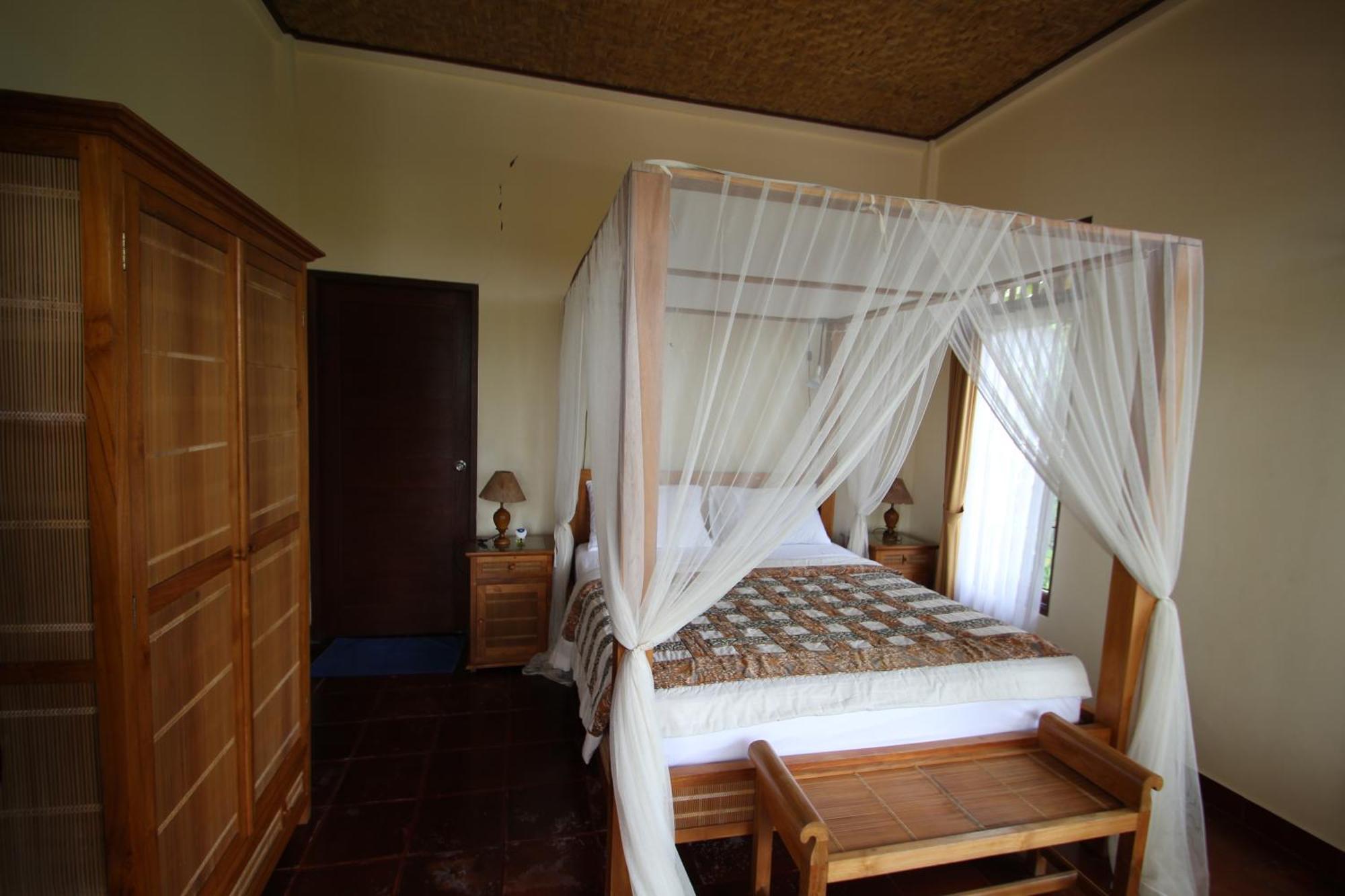 Uma Capung Mas Cottage Ubud Esterno foto
