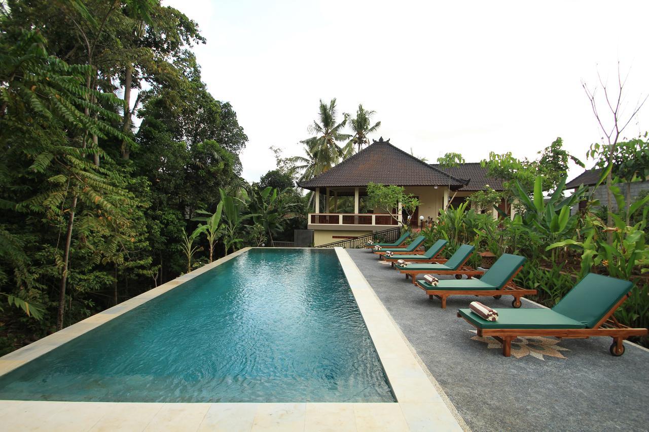 Uma Capung Mas Cottage Ubud Esterno foto