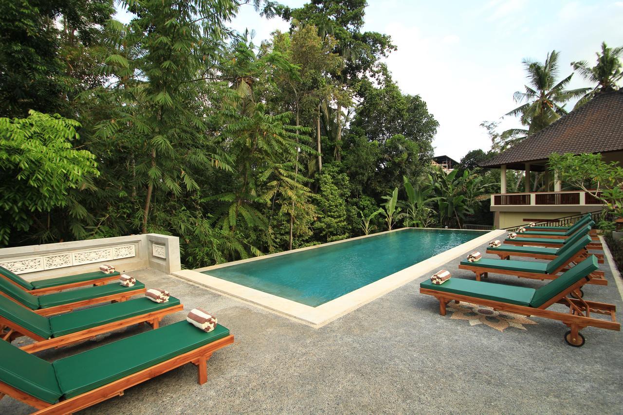 Uma Capung Mas Cottage Ubud Esterno foto